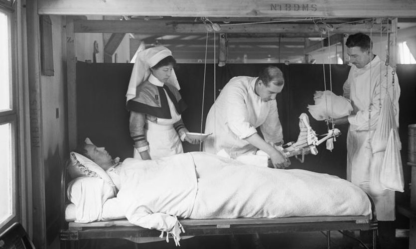 Soldier and staff in a World War One hospital
