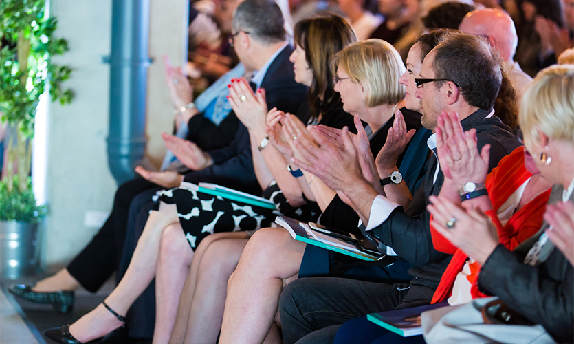 Audience applauding at the show