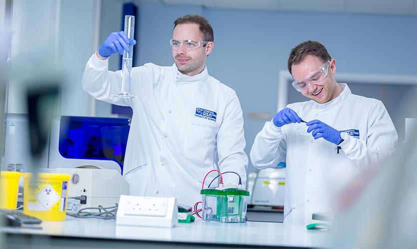 Two LJMU students in a science laboratory