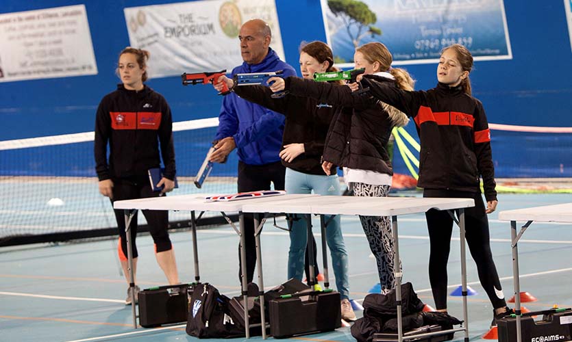 Image of group of children practicing laser shooting